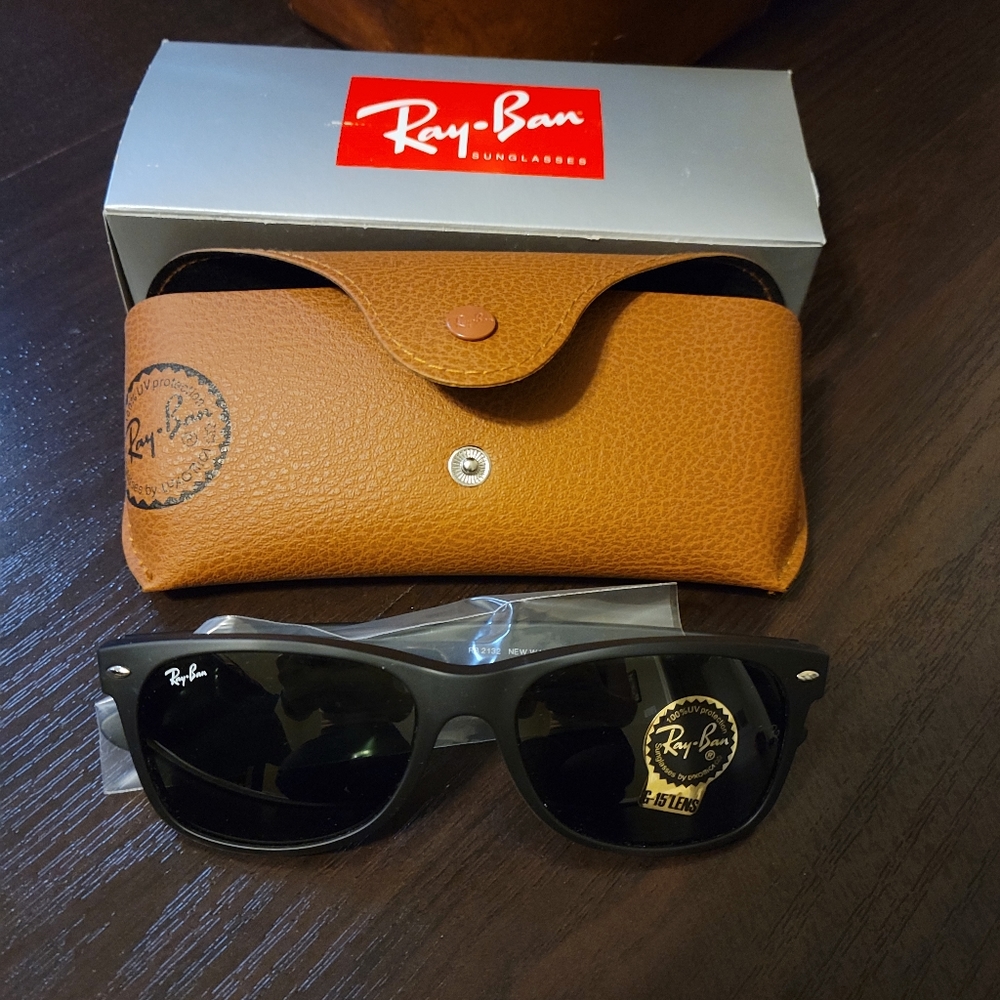 Never used Rayban sunglasses with case and box!
